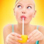 close-up-of-a-young-woman-sipping-juice.jpg