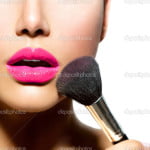 Make-up Applying closeup. Cosmetic Powder Brush for Make up